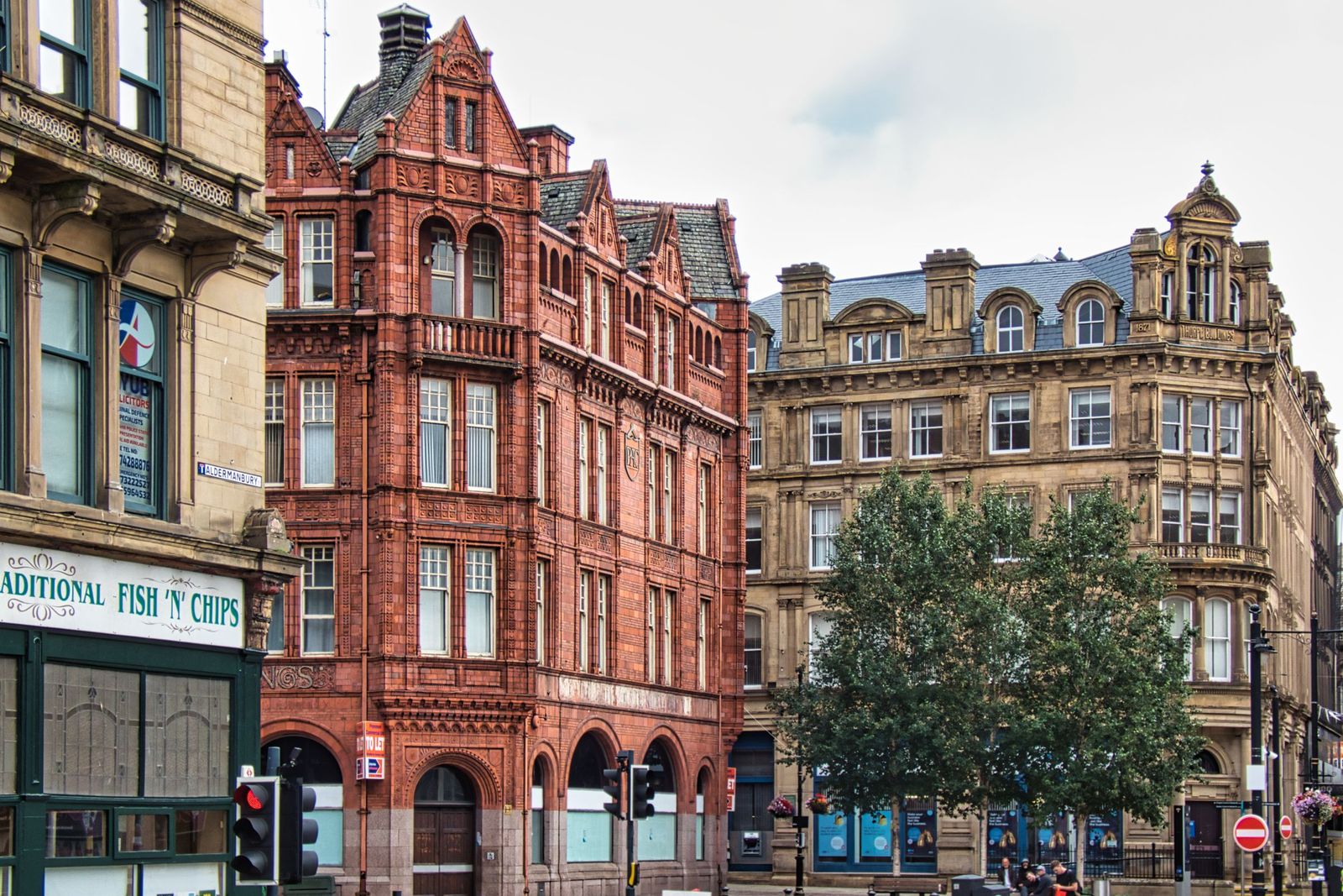 Historic Victorian buildings on a street in Bradford city centre, typical of the architecture you see when living in Bradford.