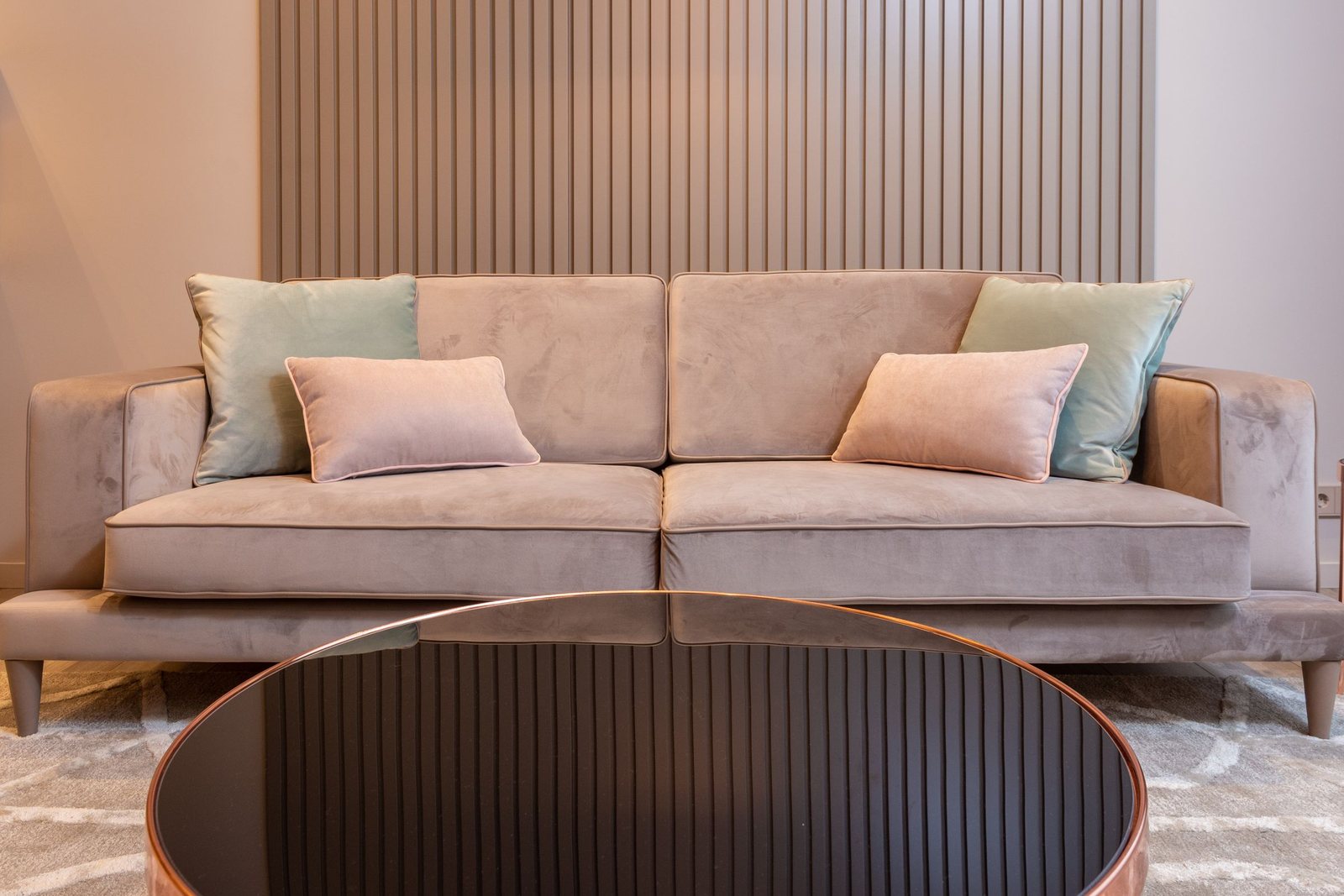 A new sofa placed in a living room after delivery